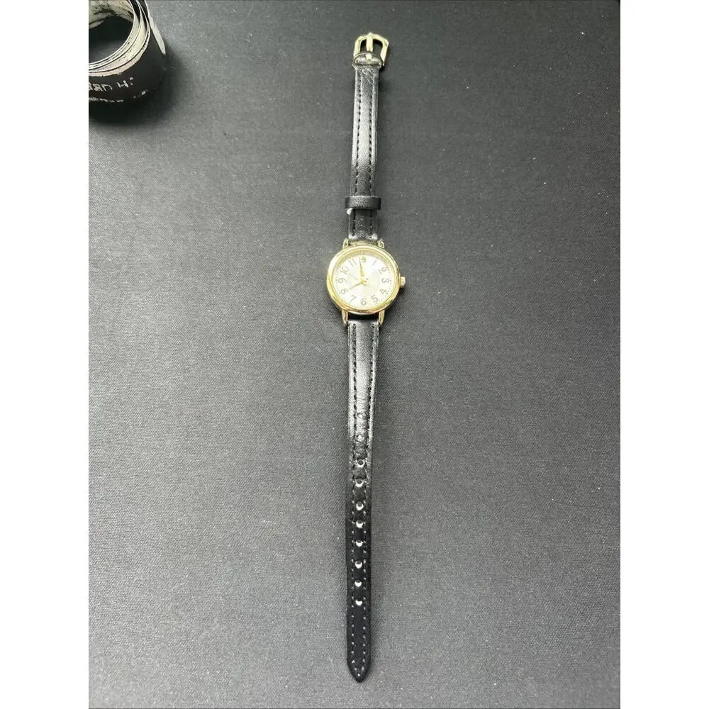 Gold Tone Silver Dial Black Band Women’s Quartz Watch
